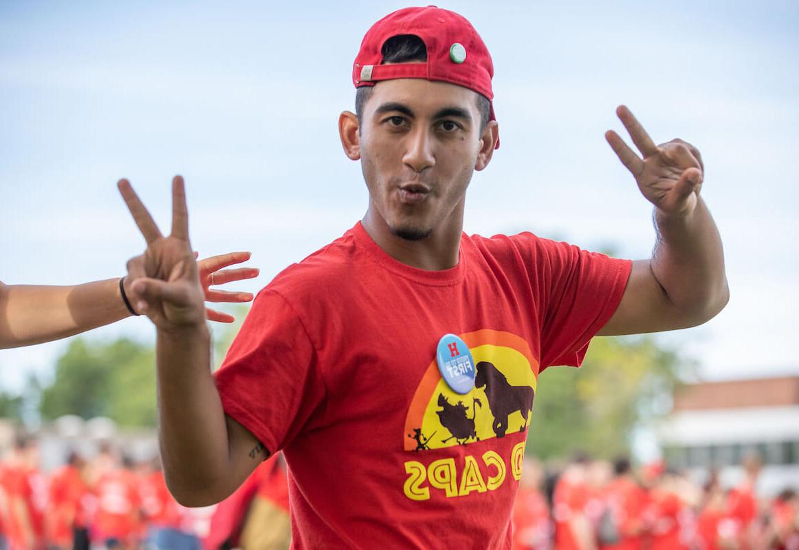 red cap at orientation