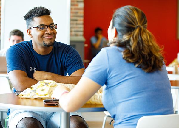 students sitting at table